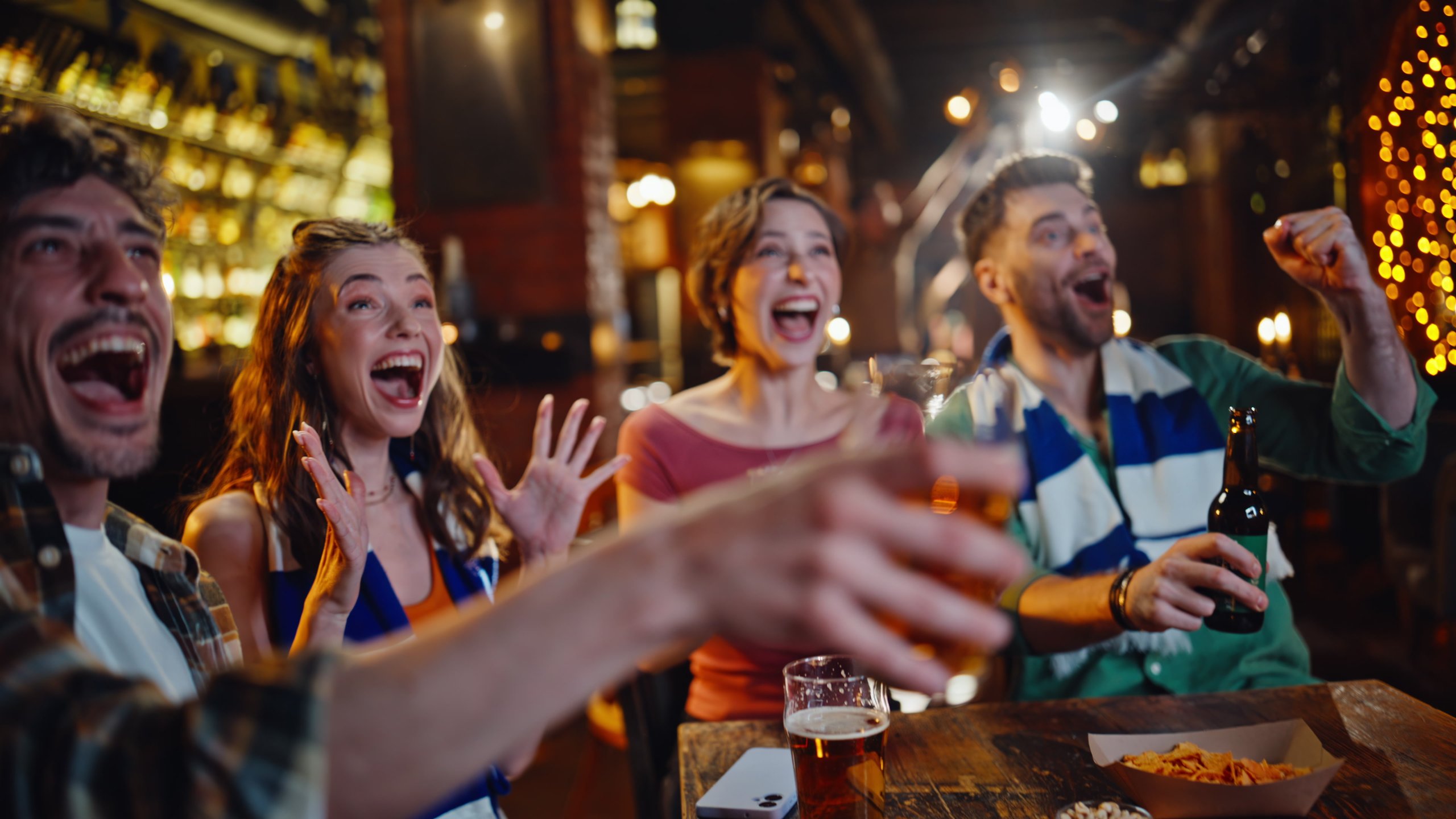 Friends laughing drinking having fun